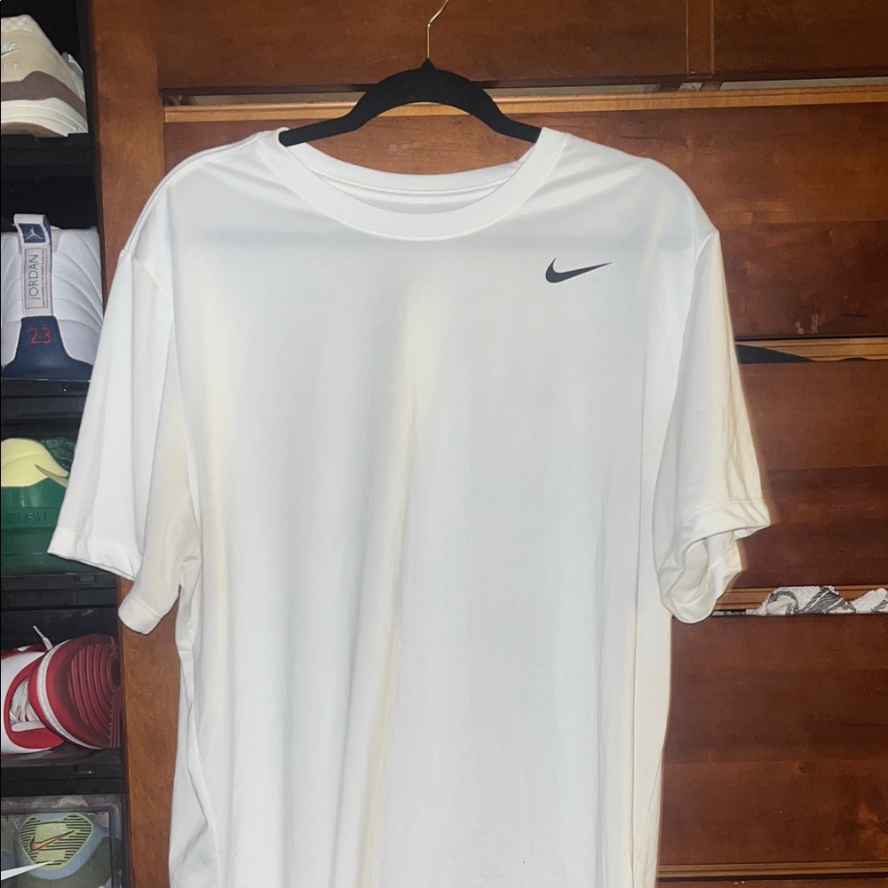 Nike White Short Sleeve Dri-FIT Tee with Black Swoosh